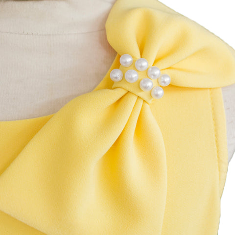 Conjunto de blusa y falda para niña color amarillo